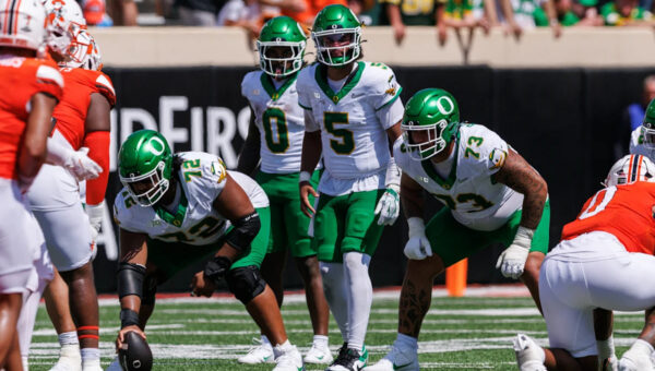 Was Oregon's offensive line giving away the type of play based on how it lined up in Oklahoma State's upset win?