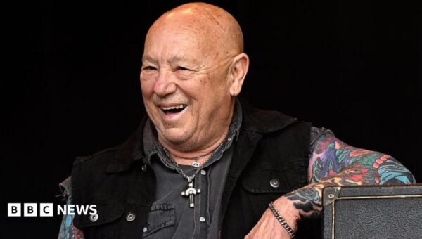 Angry Anderson, rock star who soundtracked Kylie’s wedding in Neighbours, dies aged 79