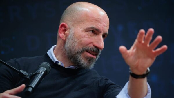 Uber's CEO says you could see lower ride prices as a result of its layoffs