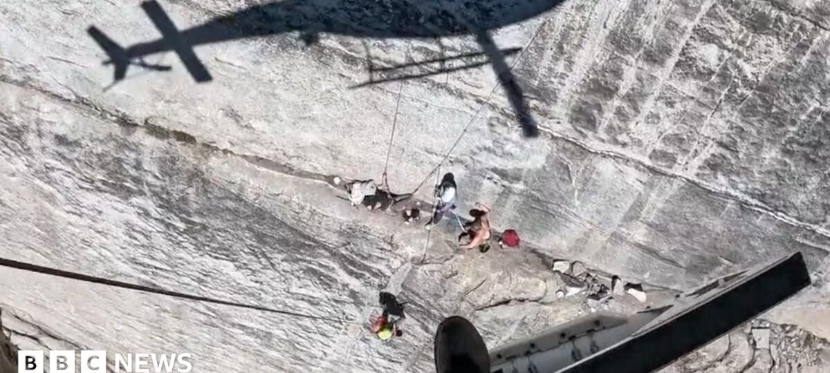 Watch: Helicopter hovers feet from cliff face during rescue