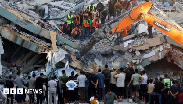 At least 20 killed and dozens missing after war-damaged Gaza building collapses