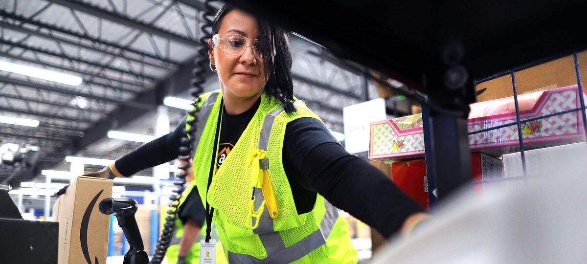 Amazon is upping its minimum hourly wage for operations workers — and offering employees a new Whole Foods discount
