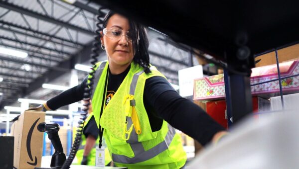 Amazon is upping its minimum hourly wage for operations workers — and offering employees a new Whole Foods discount