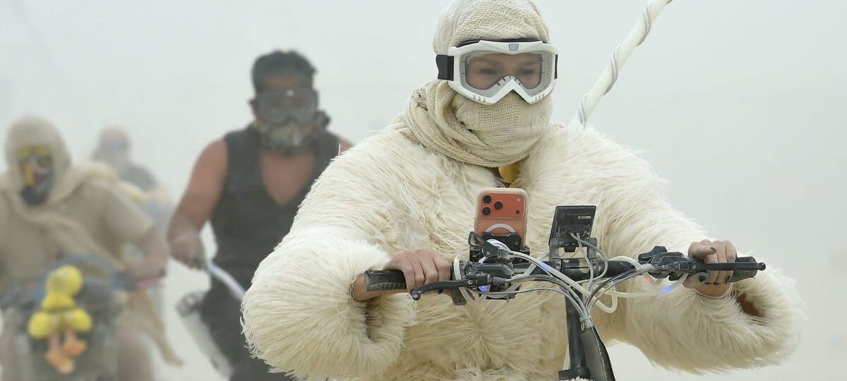 19 surreal photos show the mud, chaos, and glamour of Burning Man