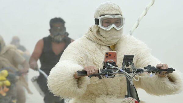 19 surreal photos show the mud, chaos, and glamour of Burning Man