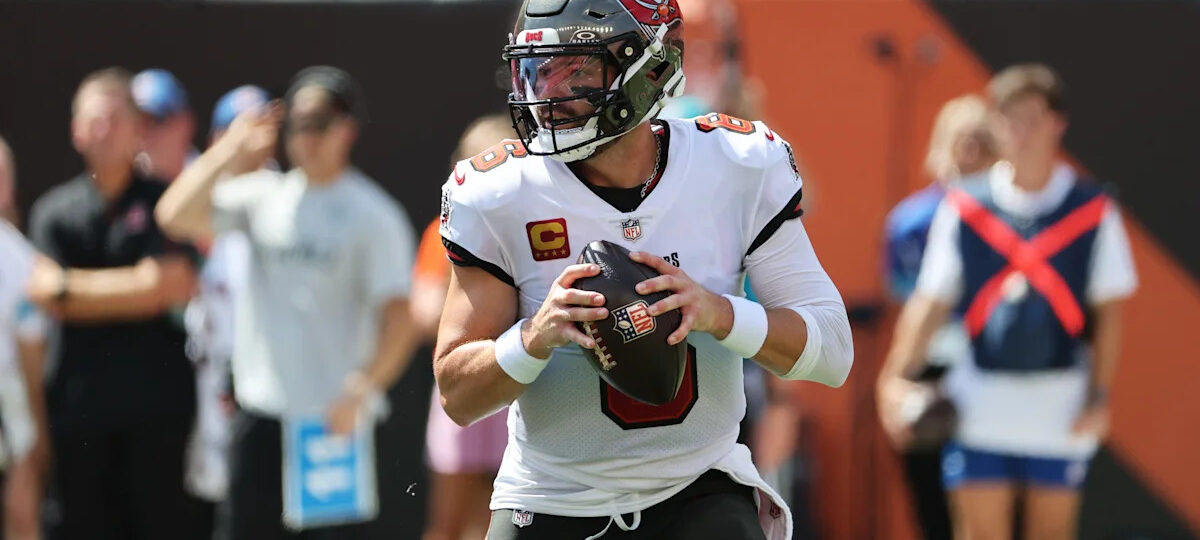 Baker Mayfield falls against former team
