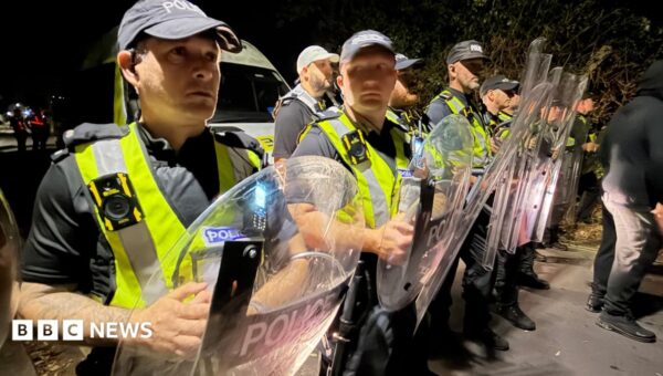 Minister condemns disorder at Portsmouth anti-migrant protest after police officers hurt