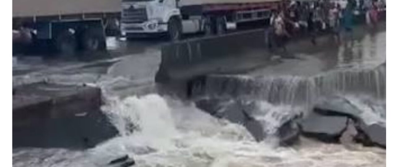 Flood washes away section of East-West road in Delta