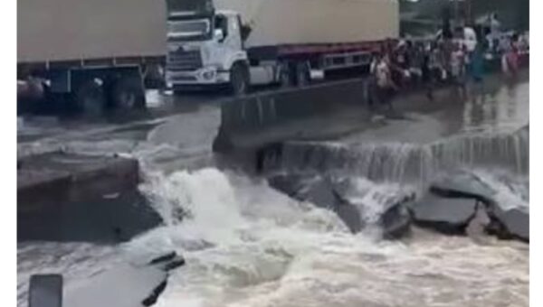 Flood washes away section of East-West road in Delta