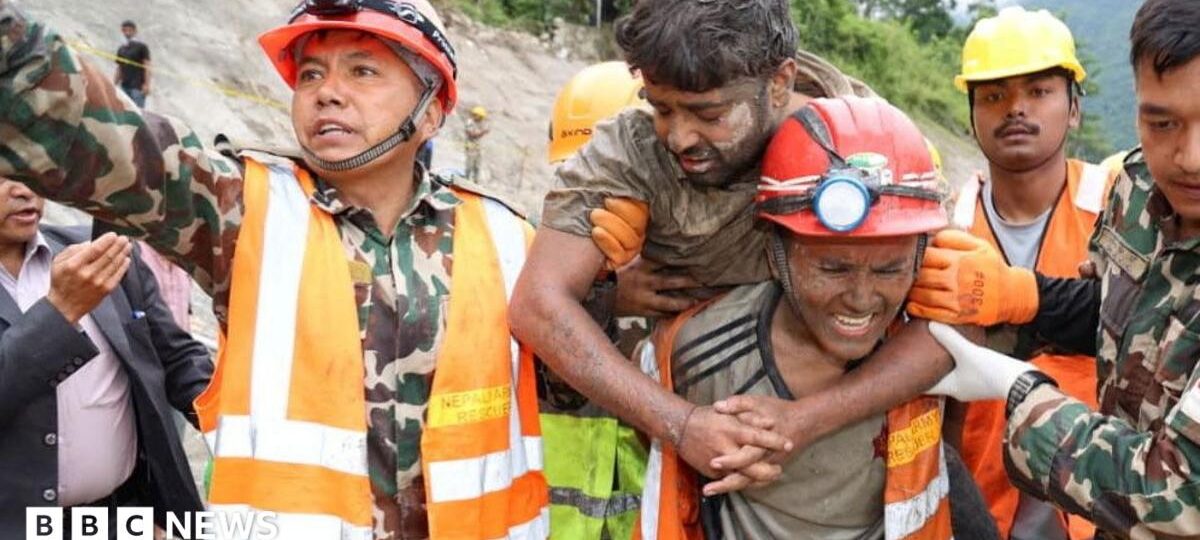 'A rare moment of joy': Nepal tunnel rescues bring hope for more flood survivors
