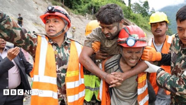 ‘A rare moment of joy’: Nepal tunnel rescues bring hope for more flood survivors