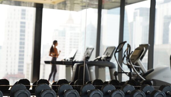How do I convince my husband to let me get a fancy gym membership despite our credit card debt?