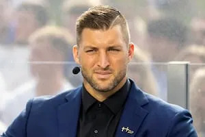 Tebow takes time out from Christian group alleged to have engaged in predatory sales
