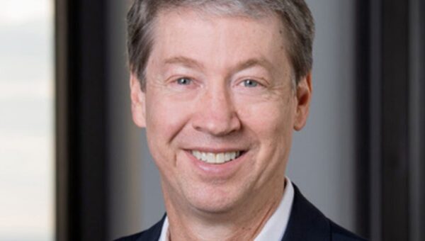 A JPMorgan veteran left to work in Detroit's government. Now he's back to help the bank's $1.5 trillion security effort.