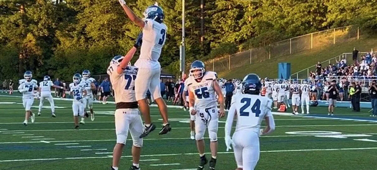 No. 5 Southington football delivers message in decisive win over Newtown behind Mierzejewski’s 3 TDs
