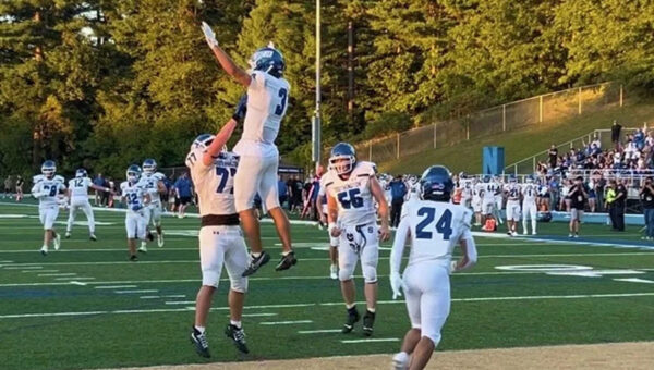 No. 5 Southington football delivers message in decisive win over Newtown behind Mierzejewski’s 3 TDs