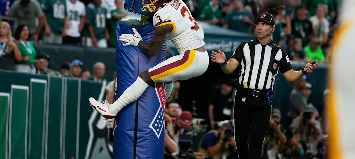 Stefon Diggs hugs the goalpost and gets flagged for costly penalty in Commanders’ loss to Eagles