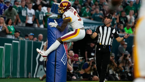 Stefon Diggs hugs the goalpost and gets flagged for costly penalty in Commanders’ loss to Eagles