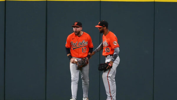 Rockies robbed on rainy night, fall to Orioles 2-1
