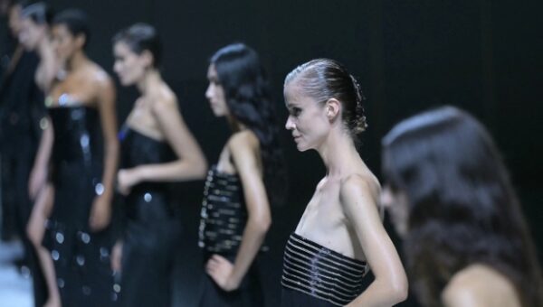 Armani Honours Founder With Crystal Sparkle, Bold Necklines At Milan Fashion Week