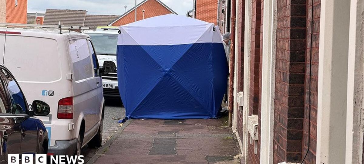 Man arrested on suspicion of murder after two people found dead at house