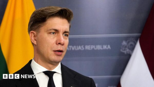 Lithuania ready to ‘fight back’ but has evacuation plans in face of Russia threats, PM tells BBC