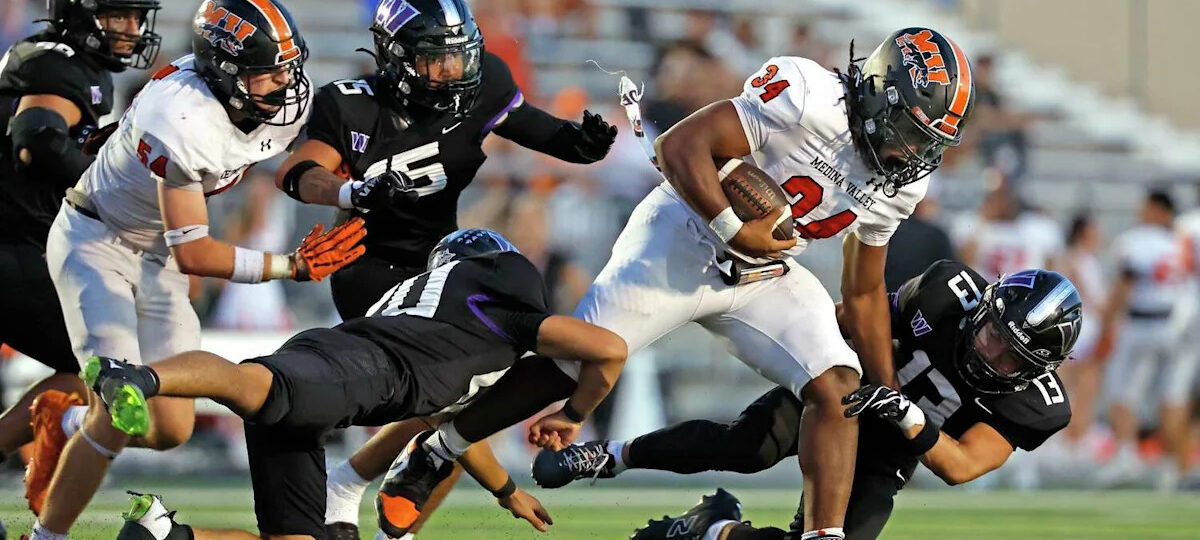 Medina Valley rumbles past Warren on strength of three-headed rushing attack