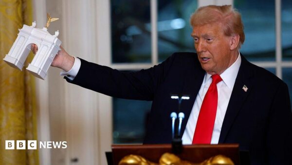 Trump says his planned triumphal arch will double as a military complex to store ammunition