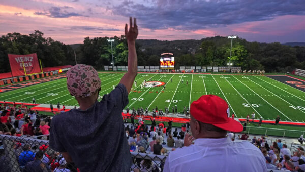 Across the US, 'Friday night lights' provide a sense of community — and, for some, a way out