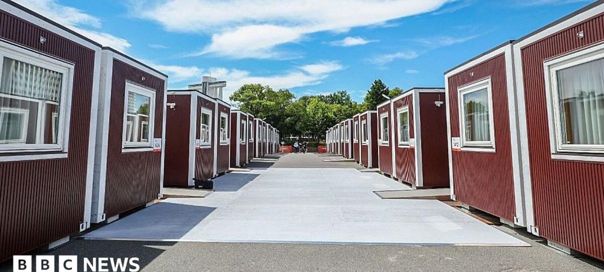 Tall athletes can't stretch their legs in container beds at Asian Games, official says