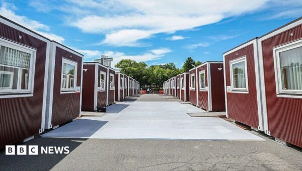 Tall athletes can’t stretch their legs in container beds at Asian Games, official says