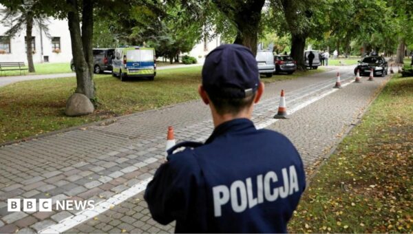 Priest killed and four injured in knife attack at Polish abbey