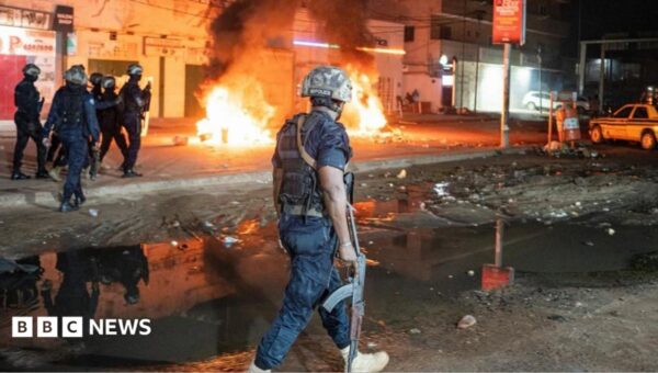 ‘You’re not alone in the darkness’: Gambia president urges calm after violent blackout protests