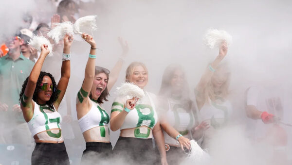 No. 1 Miami, in its first game atop AP poll since 2002 season, rolls past Pitt 52-23
