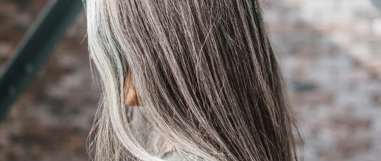 I spent $26,000 coloring my hair over the years. I'm finally going gray, and I wish I'd done it sooner.