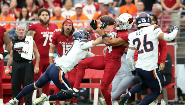 Broncos up 13-6 at halftime in Arizona