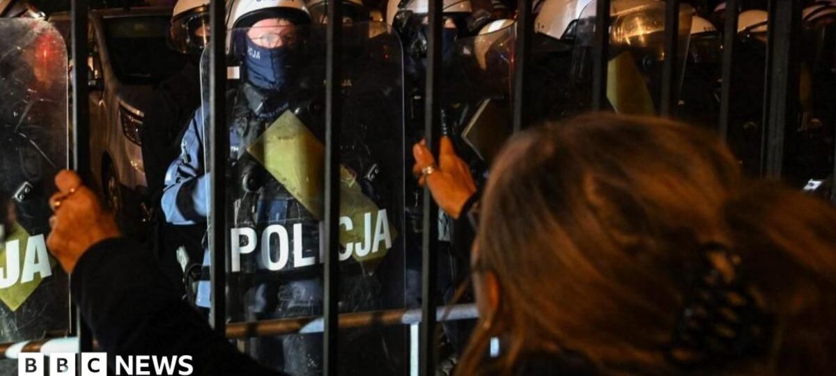 Police deployed during stand-off over control of top Poland court