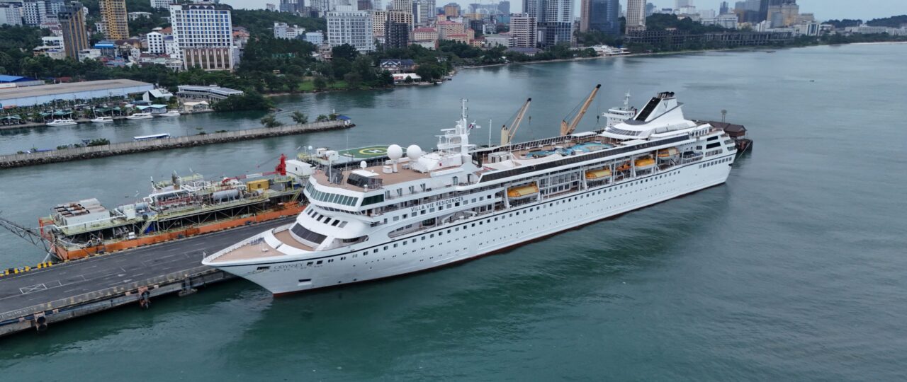 They made a cruise ship their home, then got kicked off in Cambodia. Now their dream life is on hold.