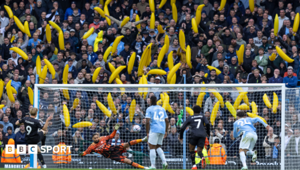 Boos and bananas on day of defiance at Man City