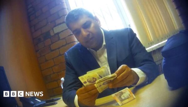Lawyer caught offering to make illegal-worker fine go away