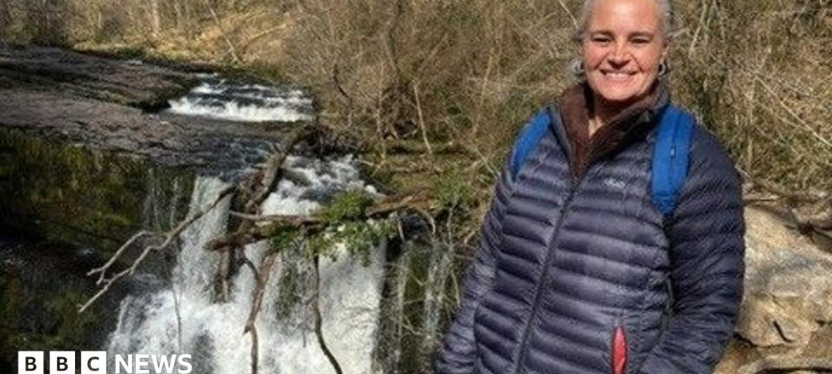 Man, 61, charged with murder after 'stabbed' woman dies following crash