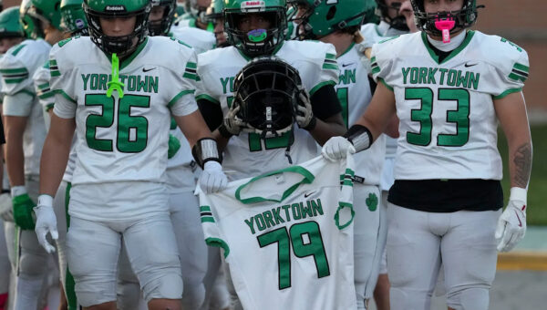 'Let's finish this for Chris.' Yorktown honors teammate Chris Wilson Jr. on emotional night