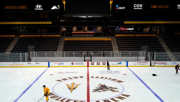Arizona State assistant hockey coach not at opener in wake of player collapse