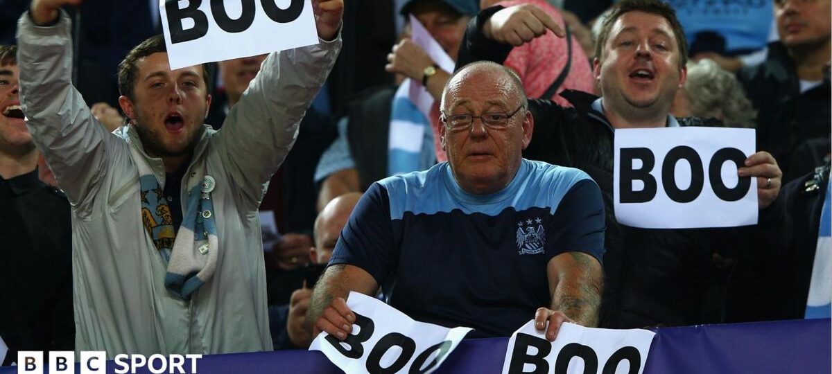 Why do Man City fans boo pre-match anthems?