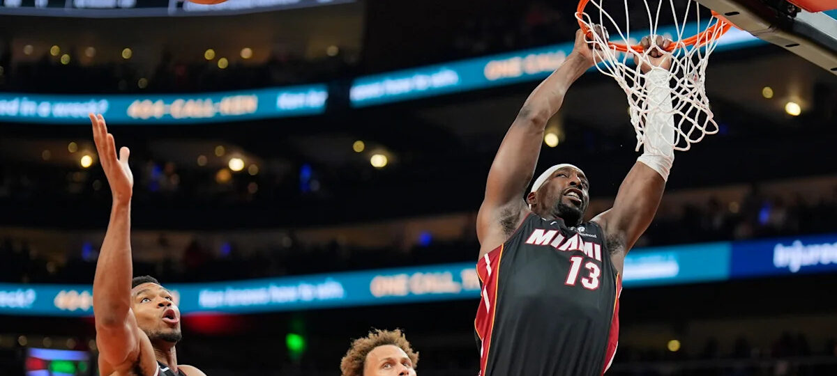 Giannis Antetokounmpo has 24 points, 18 rebounds as the Heat beat the Hawks 129-117 for first win