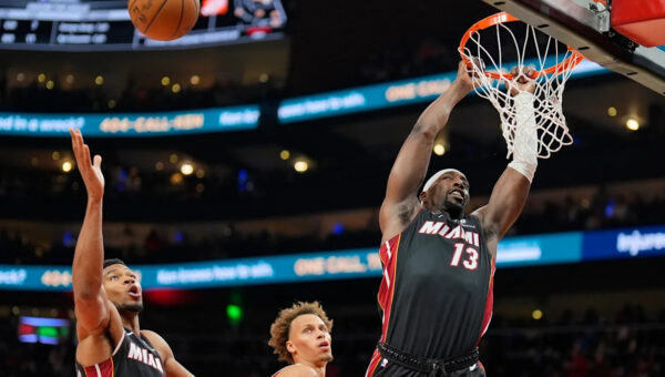 Giannis Antetokounmpo has 24 points, 18 rebounds as the Heat beat the Hawks 129-117 for first win