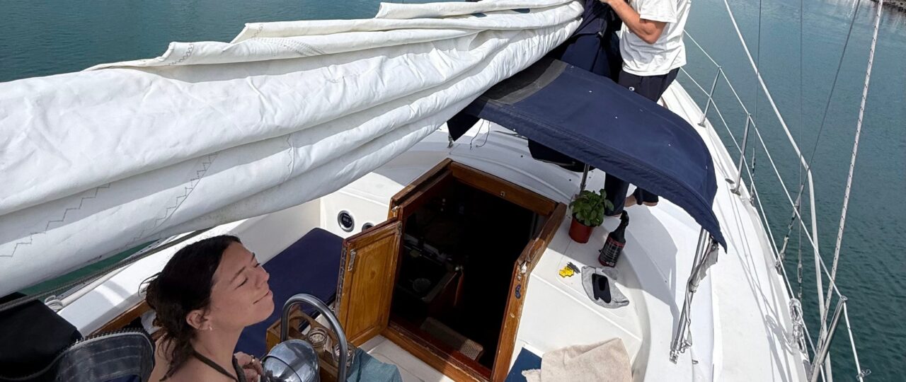 My husband and I live on a sailboat. It isn't cheap, but the perks keep winning us over.