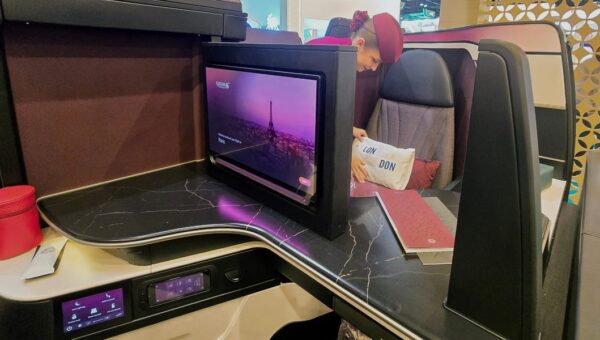 I toured Qatar's new Qsuite business class, which passengers are still waiting to fly. These are the 7 best upgrades.