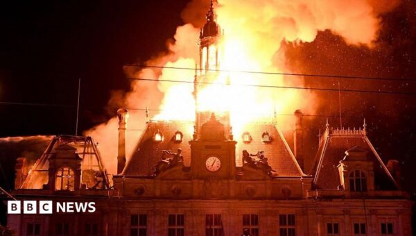 Violent clashes, looting and buildings ablaze in France as over 1,000 arrested after protests