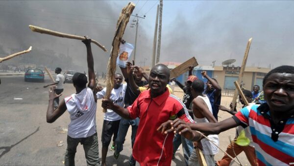 Youths clash with thugs over Tinubu campaign at Independence Day festival in Abuja [VIDEO]